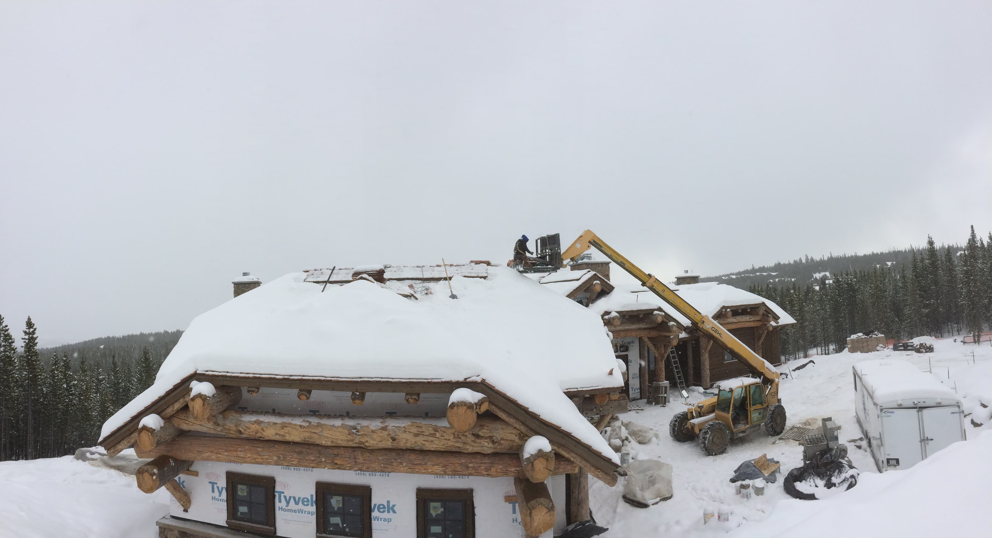 New construction roof with split cedar shakes and corrugated metal in Spanish Peaks